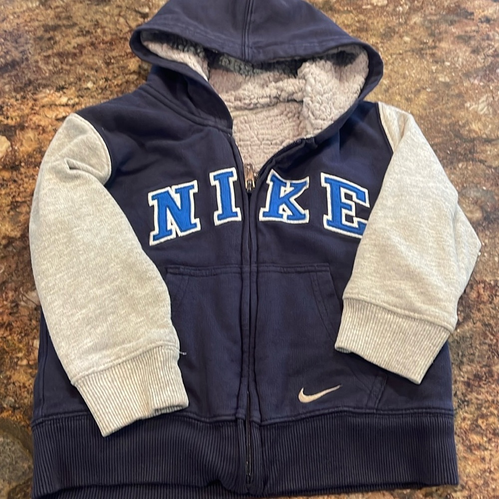 Nike size 4 zip up Sherpa lined hoodie.